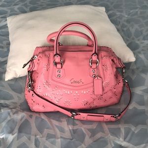 Adorable pink leather coach bag.